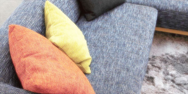 布張ソファとクッションのイメージ